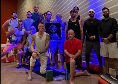 Group photo of Male Compass members after a wellness session